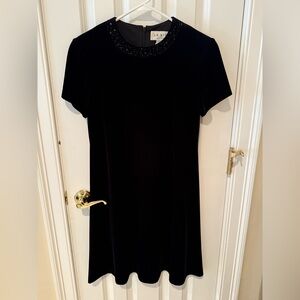 Black velvet dress with beaded neckline, size 8.